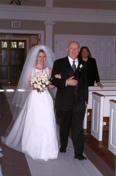 083 sharon and dad walking aisle